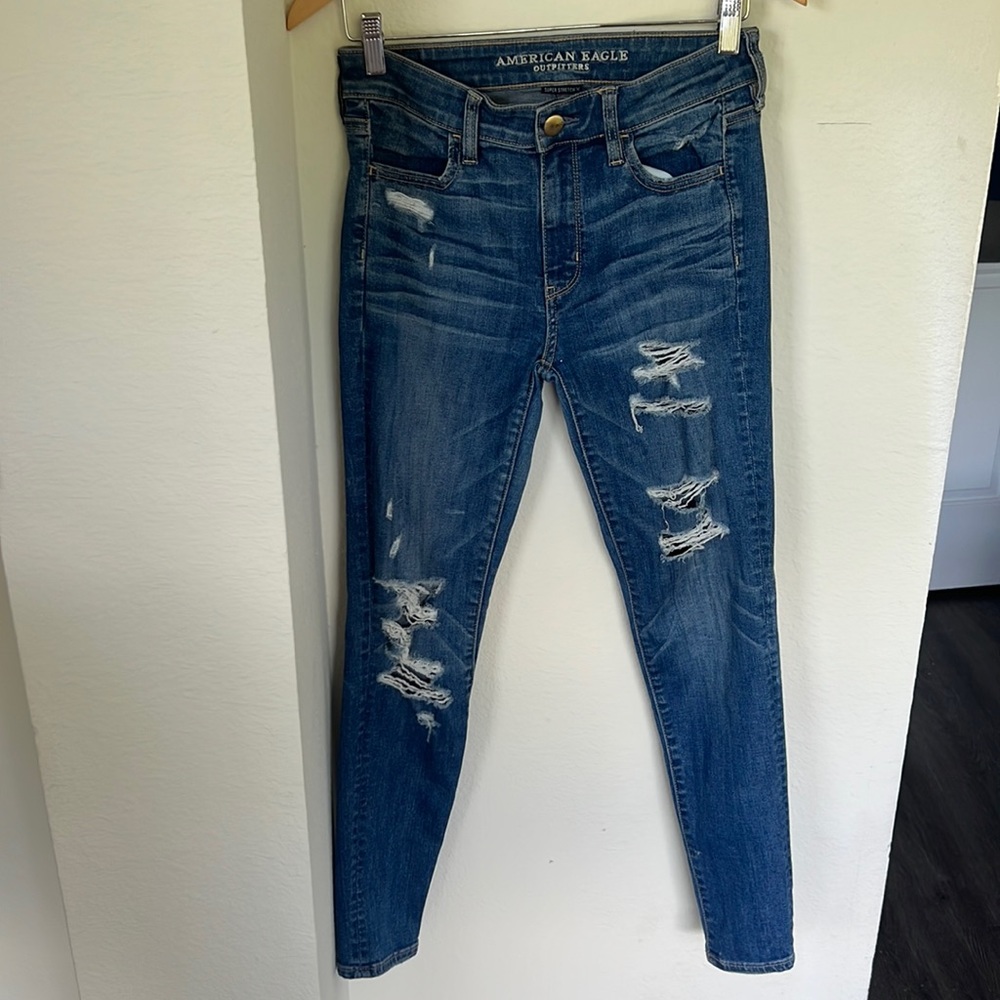 American Eagle mid-rise distressed medium-washed jeans